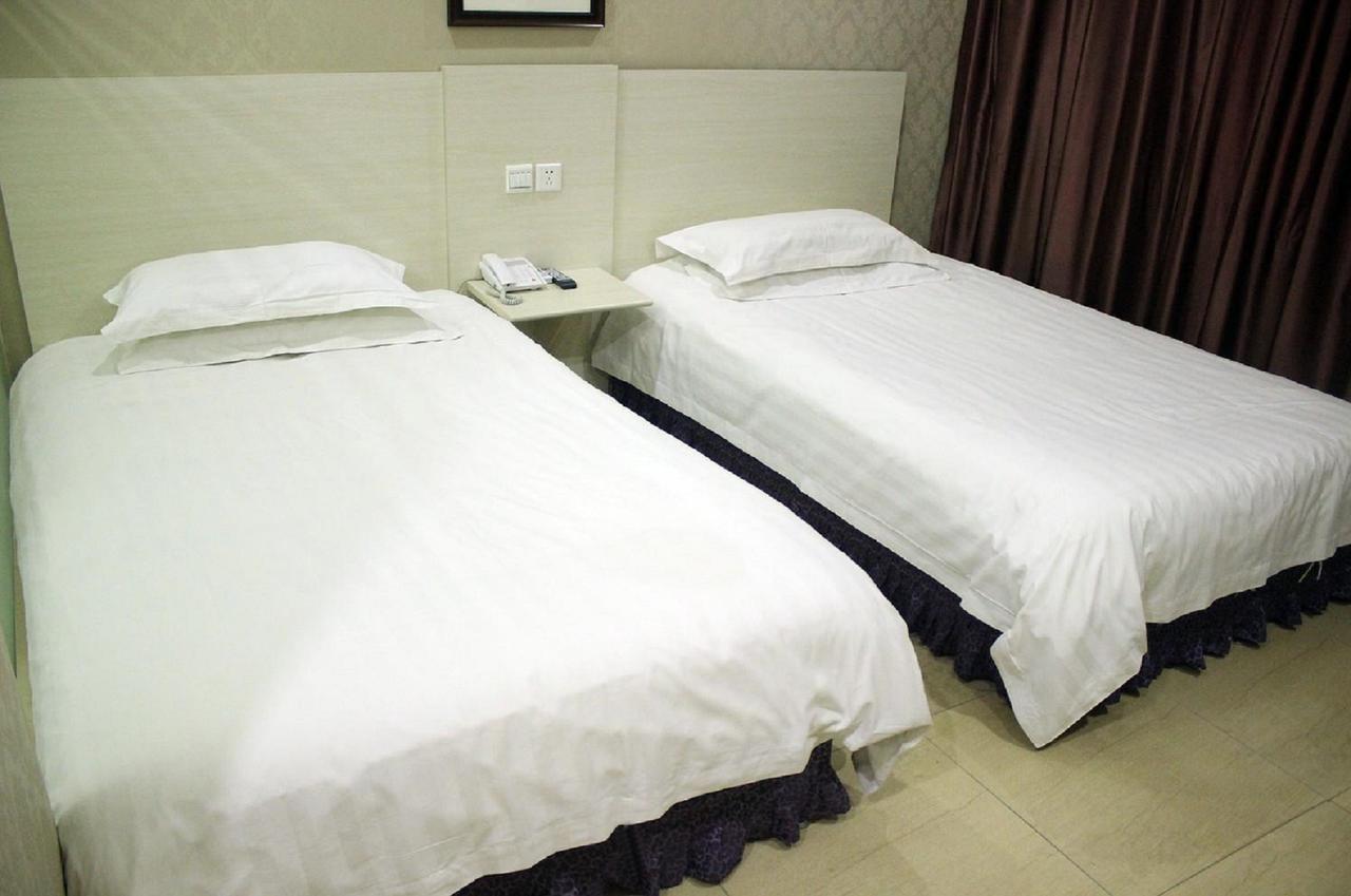Starway Hotel Nantong Sports Convention Center Номер фото